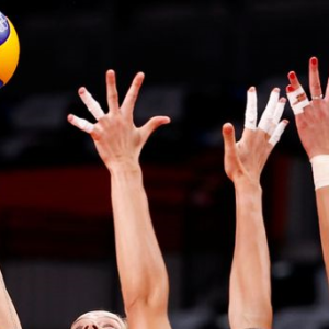 photo of hands reaching for the volleyball