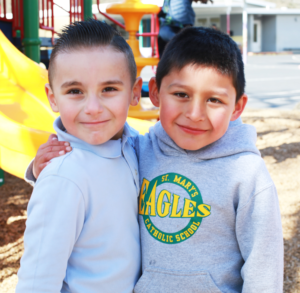 photo of two sweet kindergarten students.